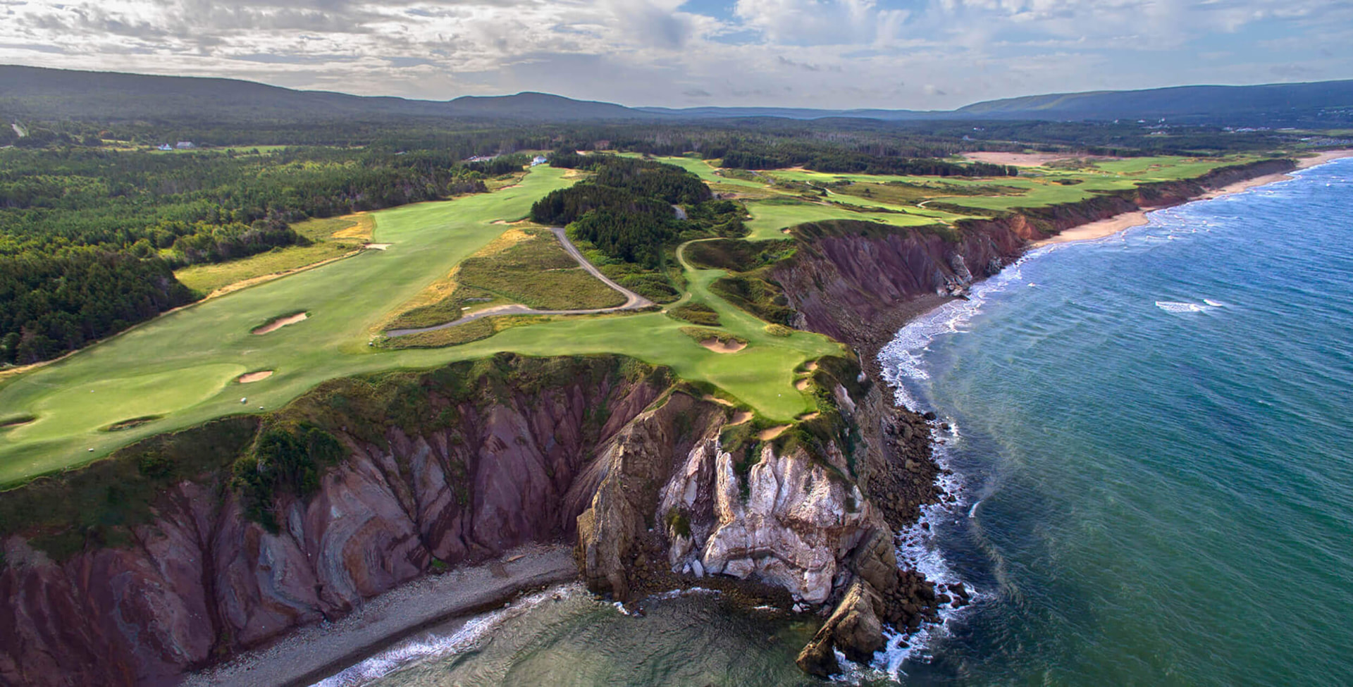 Coastal golf hole at Cabot Cliffs overlooking the Atlantic Ocean